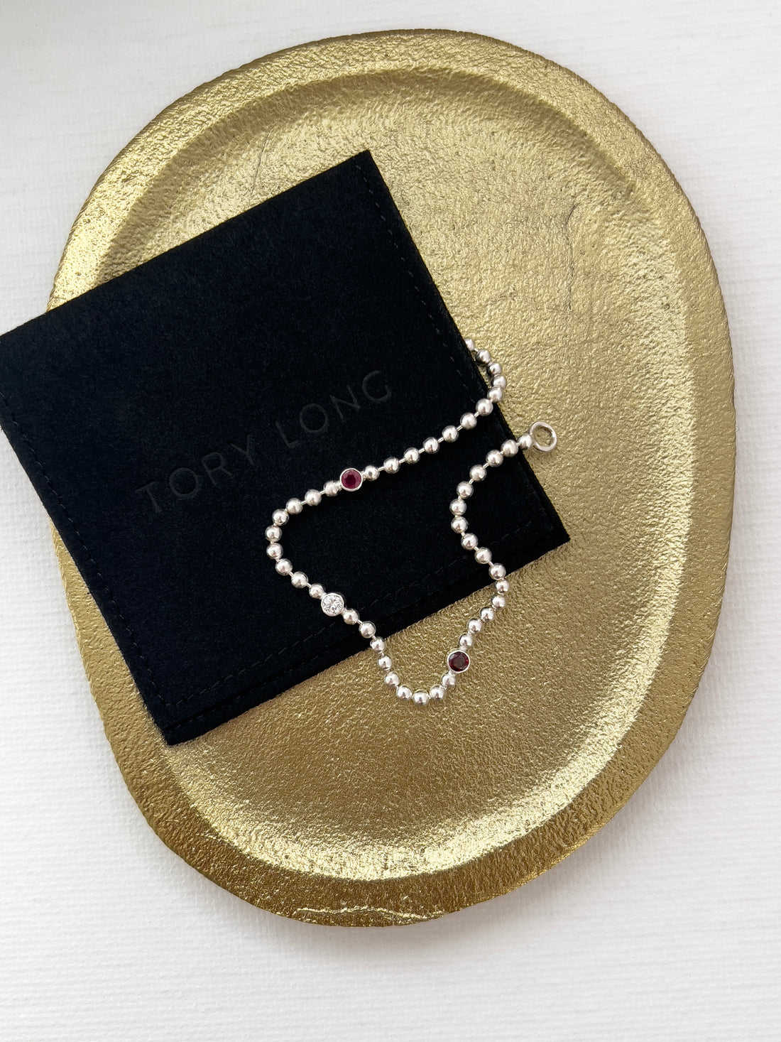 Silver ball chain bracelet with ruby, diamond and garnet on a gold plate
