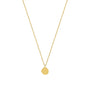 A gold pendant necklace with a small, flat, circular pendant on a delicate chain.