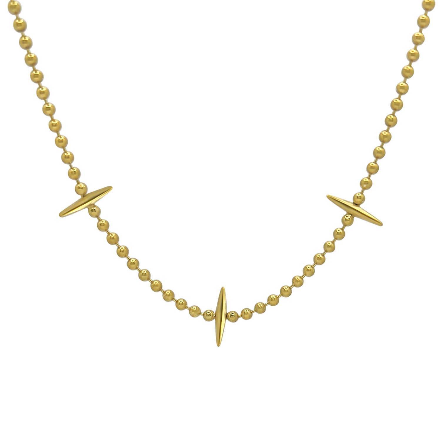 A gold-colored necklace with a ball chain design and three spike-shaped pendants positioned at intervals along the chain.