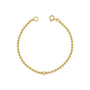 Gold bracelet with a single diamond on a white background