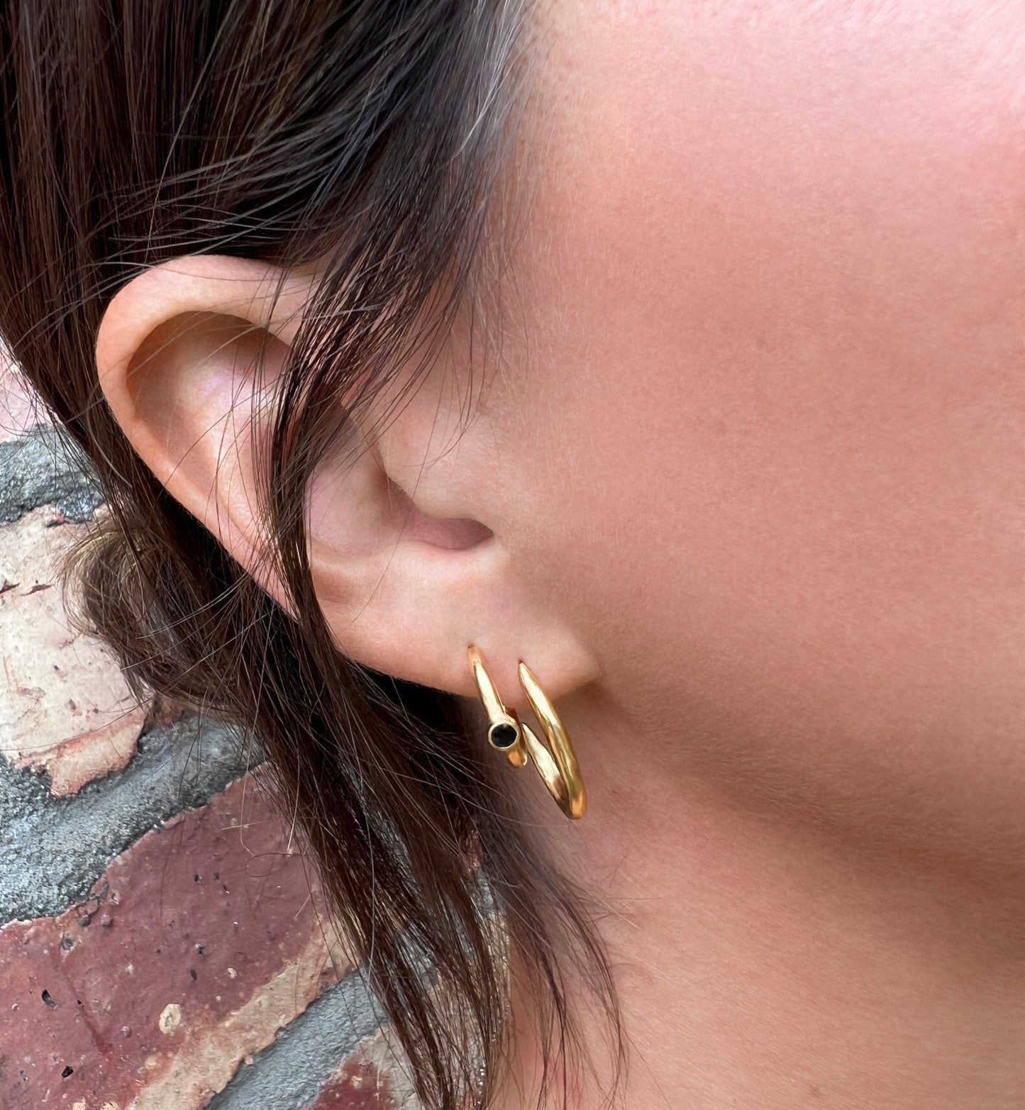 gold hoop with black sapphires